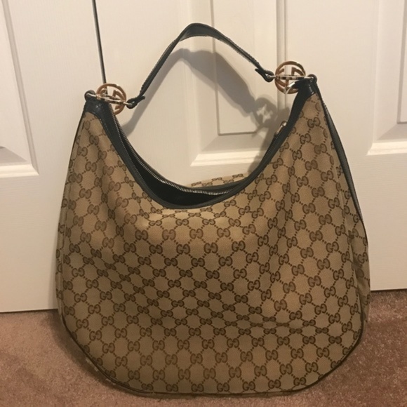 Gucci Handbags - ⭐️HP⭐️100% Authentic Gucci GG Large Hobo Bag!